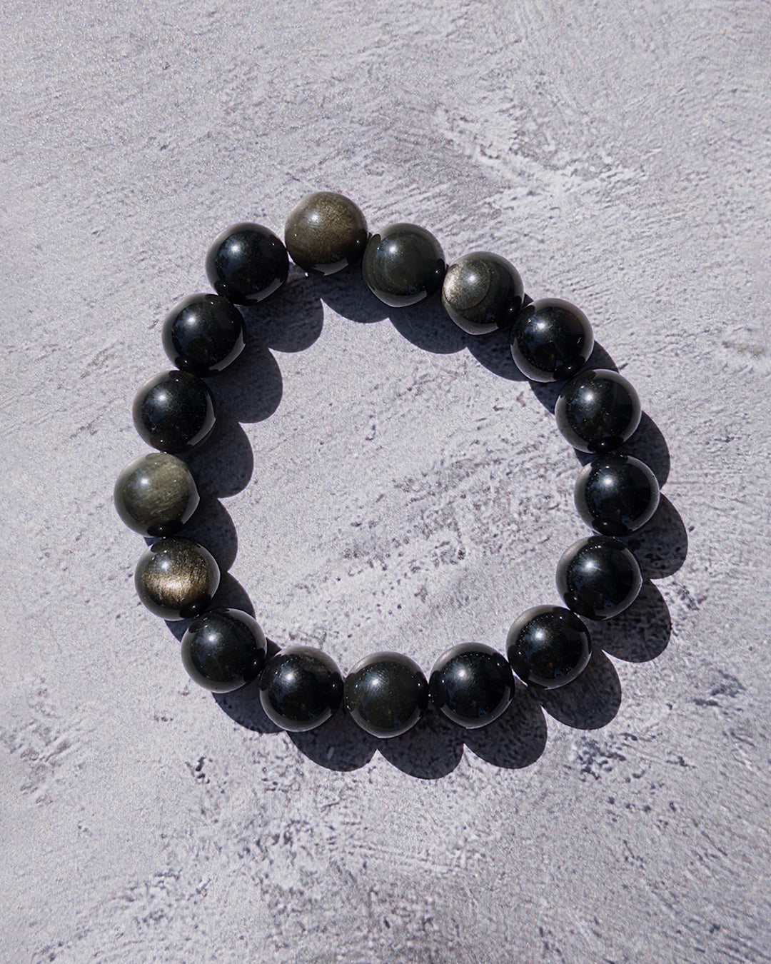 Pulsera obsidiana dorada 14mm