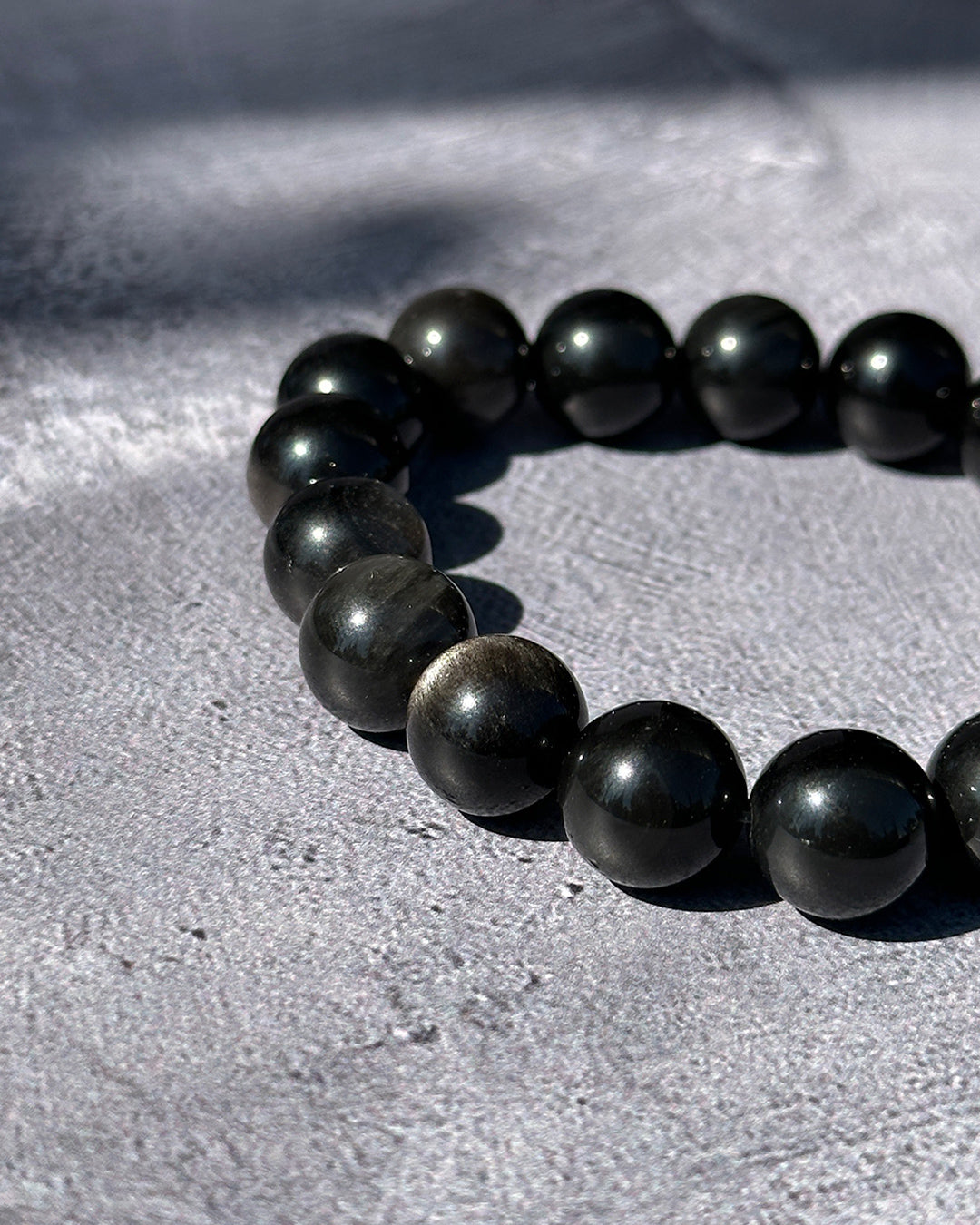 Pulsera ajustable obsidiana dorada 4mm