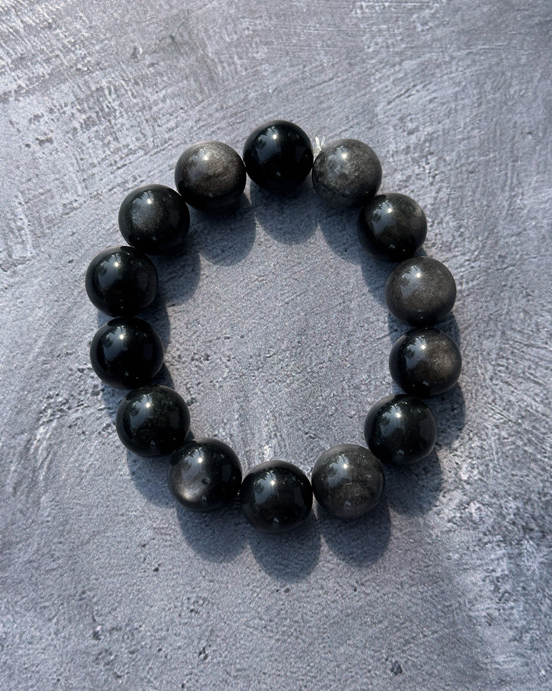 Pulsera obsidiana plateada 14mm