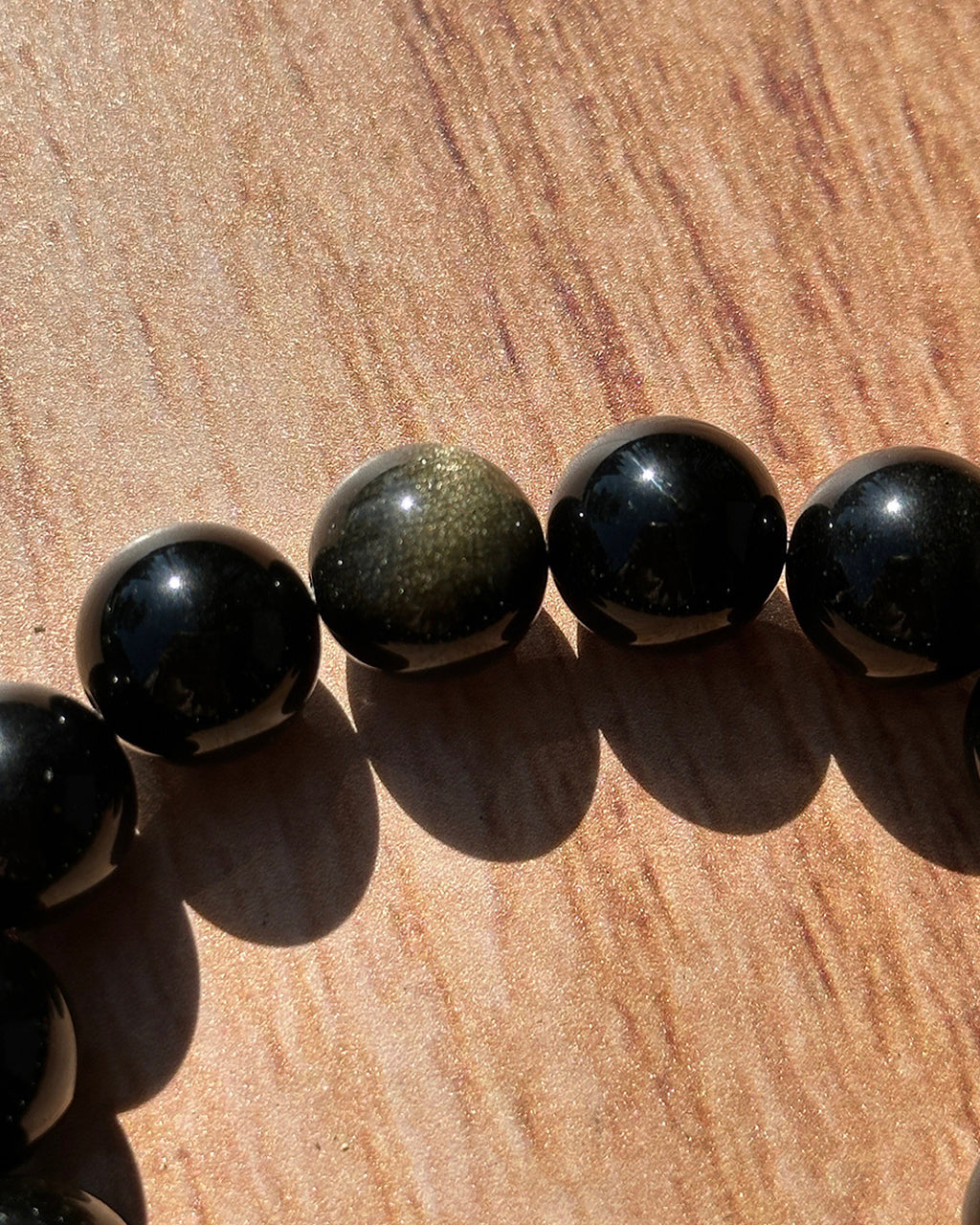 Pulsera ajustable obsidiana dorada 6mm