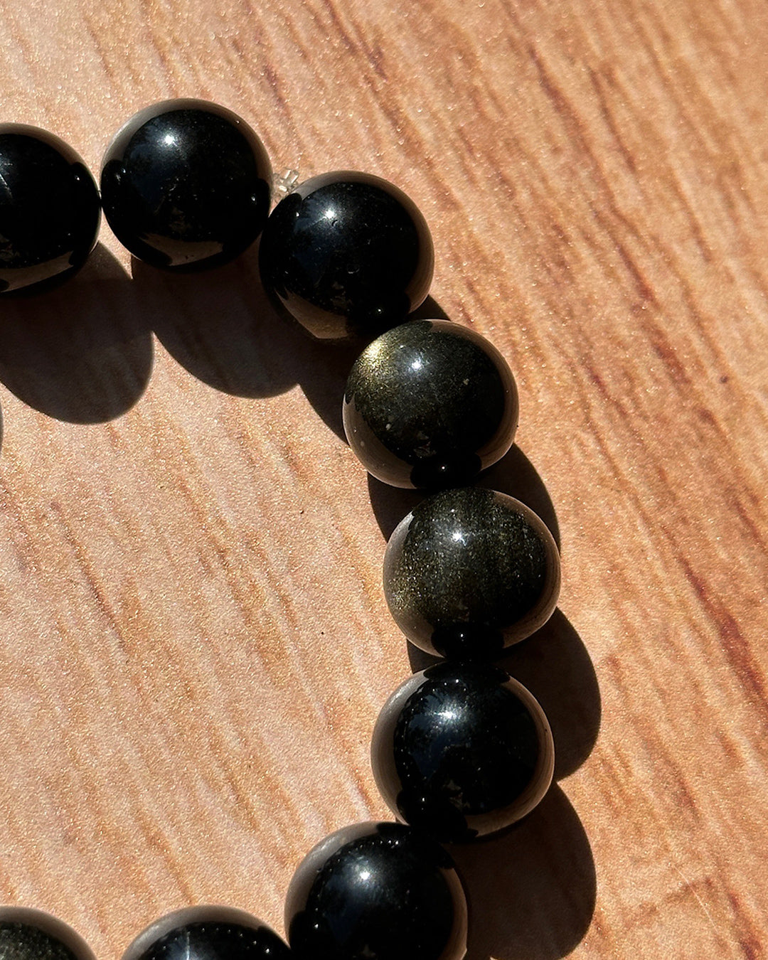 Pulsera ajustable obsidiana dorada 4mm