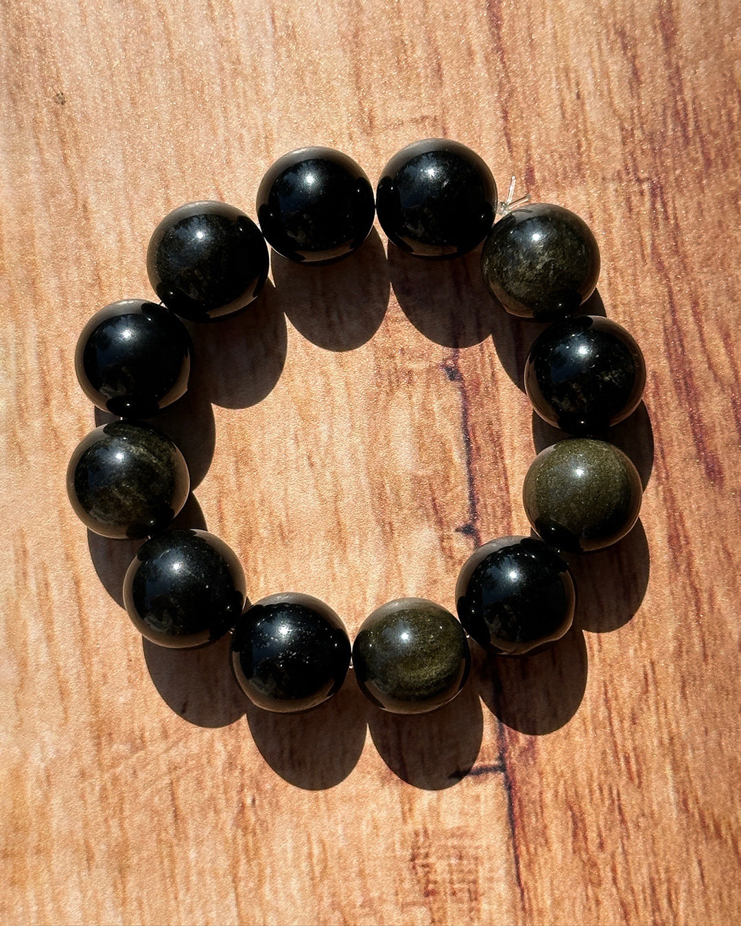 Pulsera obsidiana dorada 16mm