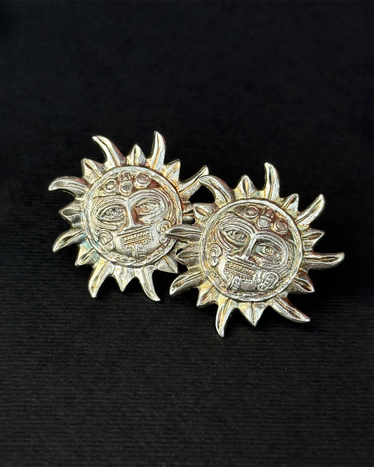 aretes sol con grecas