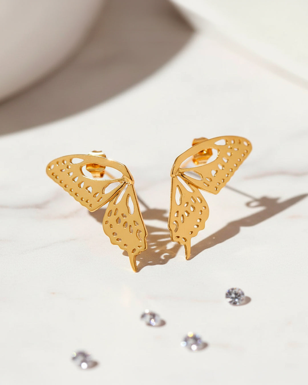 aretes mariposa cola de golondrina