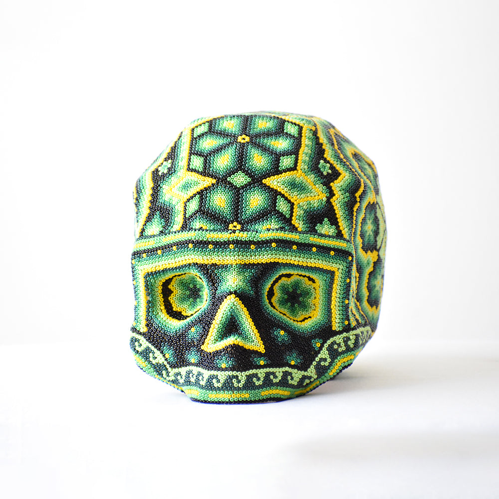 craneo huichol verde