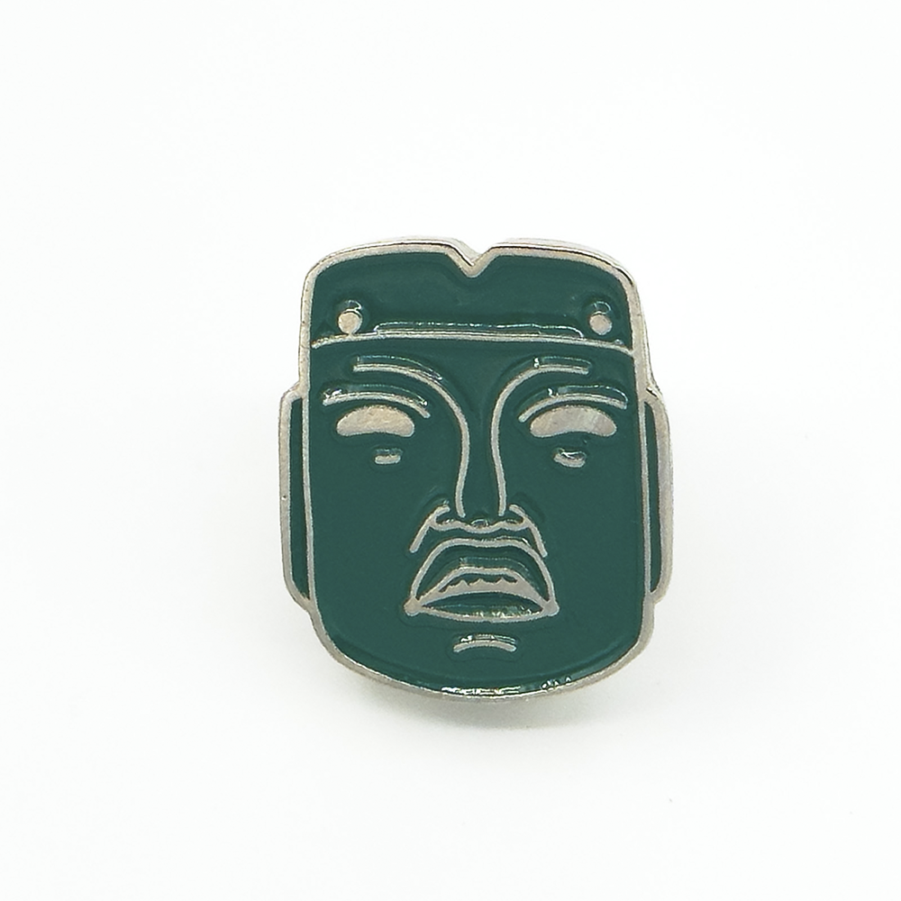pin máscara de piedra verde